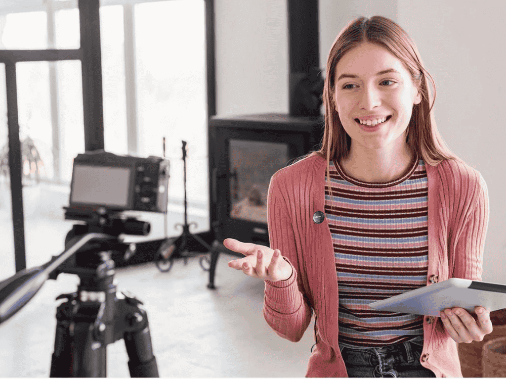 lady content creator using a vlogging microphone for YouTube
