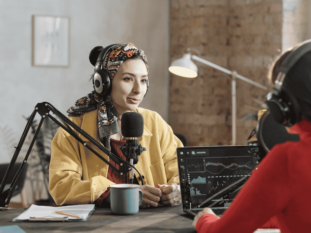2 person recording podcast using a podcast microphone