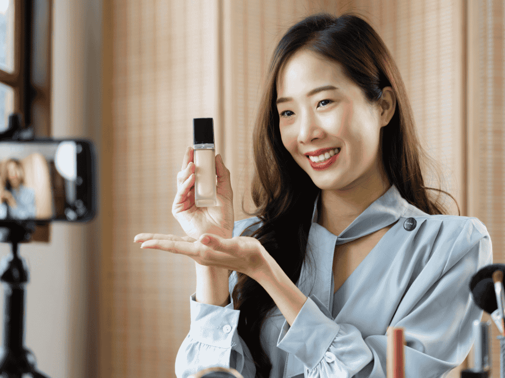 A lady content creator doing a product review vlog using a wireless microphone