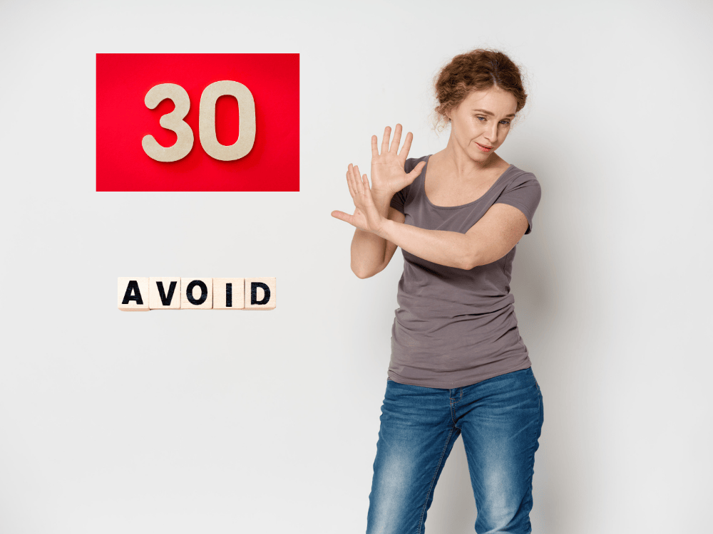 A lady in her thirties showing her willingness to let go of things or food to avoid