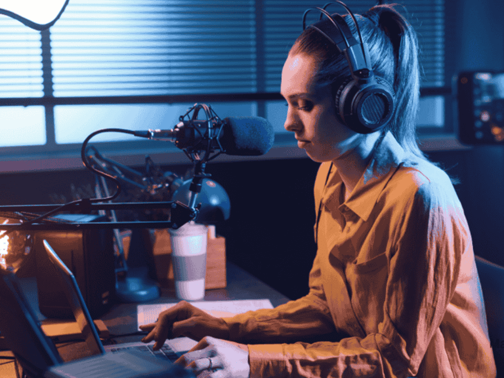 a lady livestreaming using an xlr usb microphone