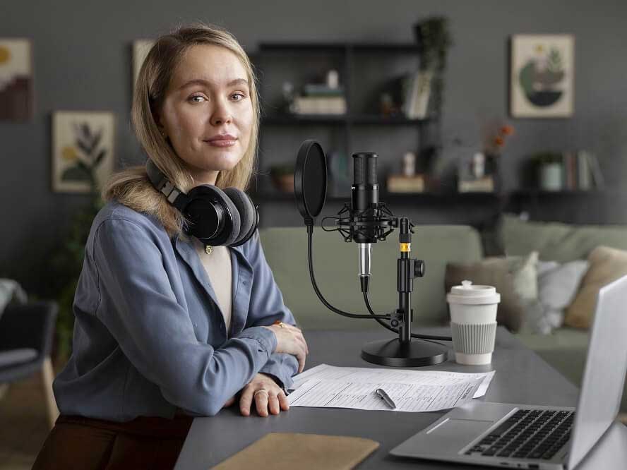 a lady using a dubbing microphone for her dubber job