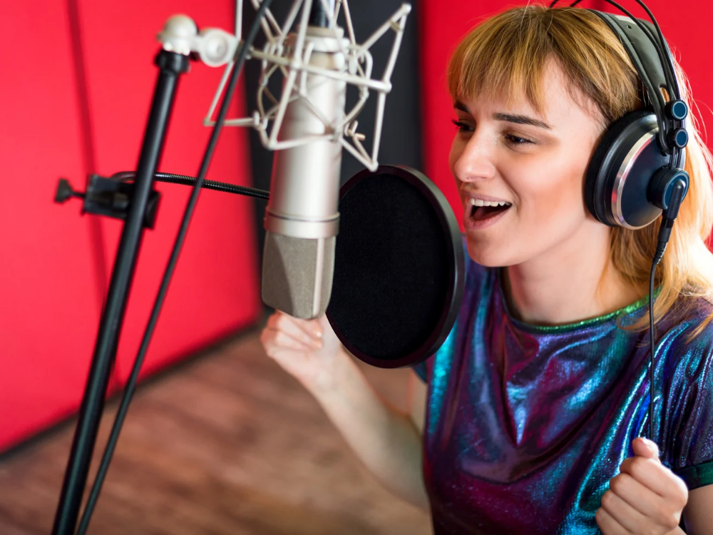 a voice over artist using a usb computer microphone